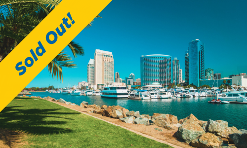 city scape of san diego with yellow banner with text Sold Out!