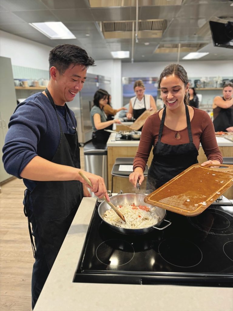 Students cooking at a seminar