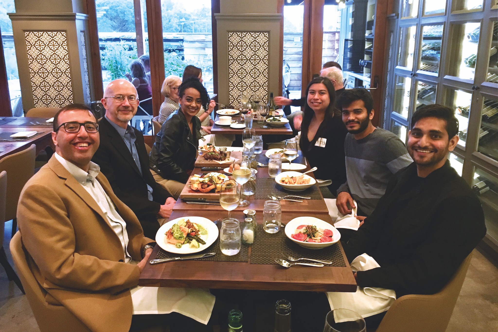 Goran Matijasevic meets with other UCI alumni.