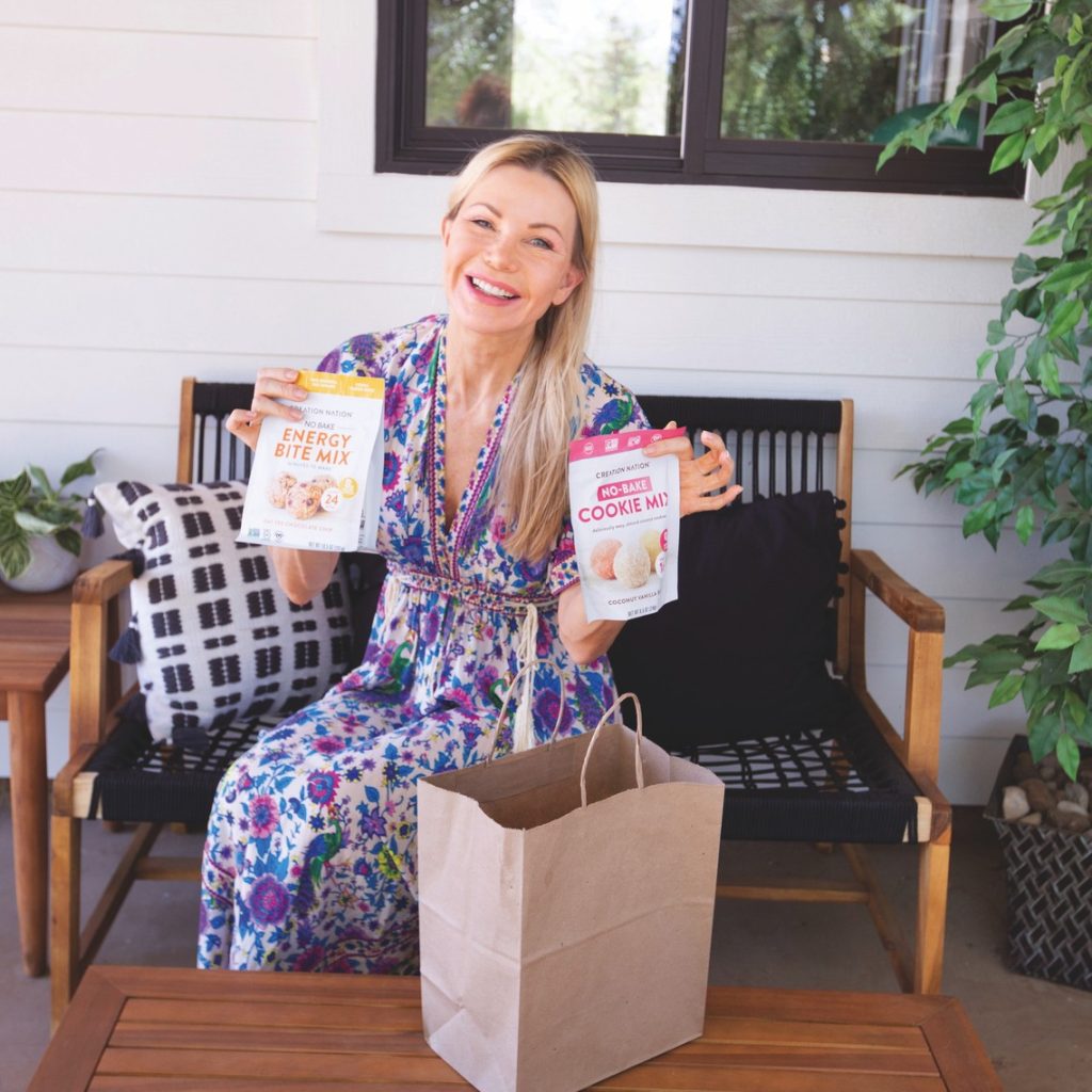 Karen Nation holding up her baking mixes