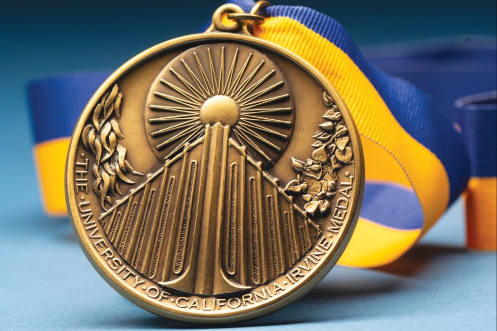 UCI medal with blue and gold ribbon
